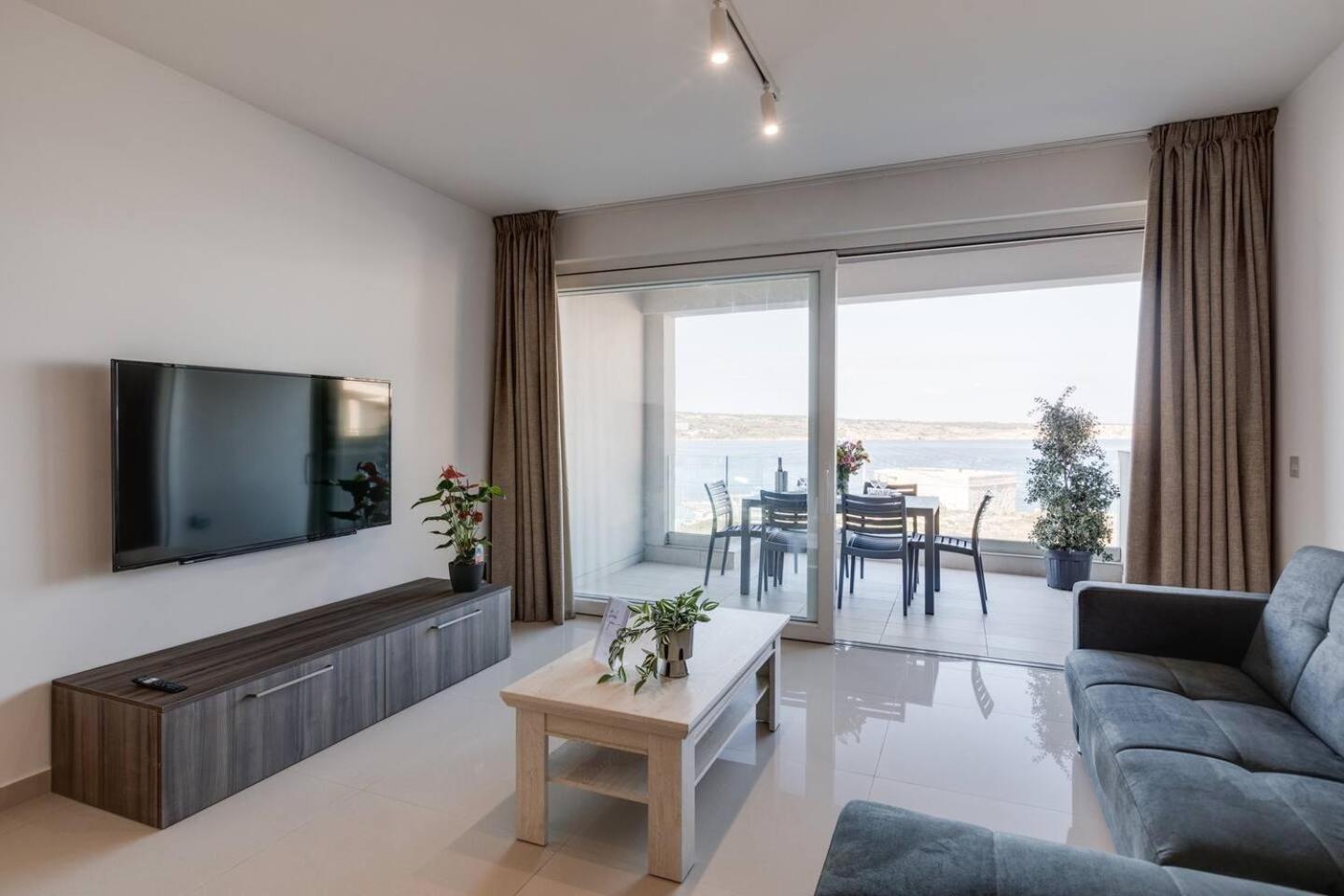 Апартаменты 9ten11 Seafront By Homely